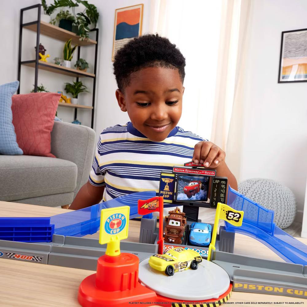and Pixar Cars Piston Cup Stunting Speedway Playset with Lightning McQueen Toy Car - Image 2
